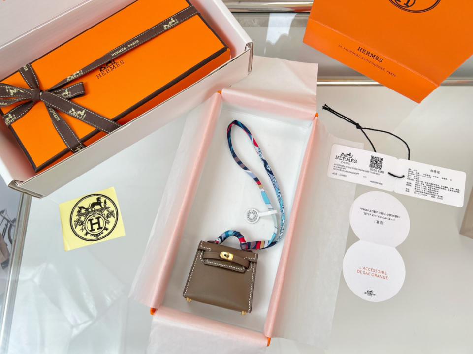 designer,replica,clothing,fake,1:1,lv,luxury,high quality HERMES mini Kelly bag (elephant gray) kelly twilly charm designer,replica,clothing,fake,1:1,lv,luxury,high quality HERMES mini Kelly bag (elephant gray) kelly twilly charm