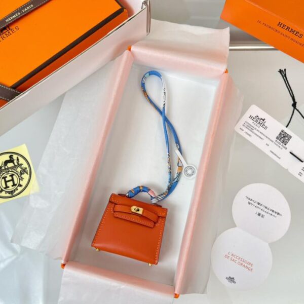 designer,replica,clothing,fake,1:1,lv,luxury,high quality HERMES mini Kelly bag (persimmon orange) kelly twilly charm
