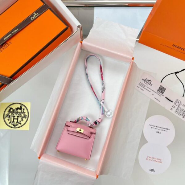 designer,replica,clothing,fake,1:1,lv,luxury,high quality HERMES mini Kelly bag (cherry blossom pink) kelly twilly charm