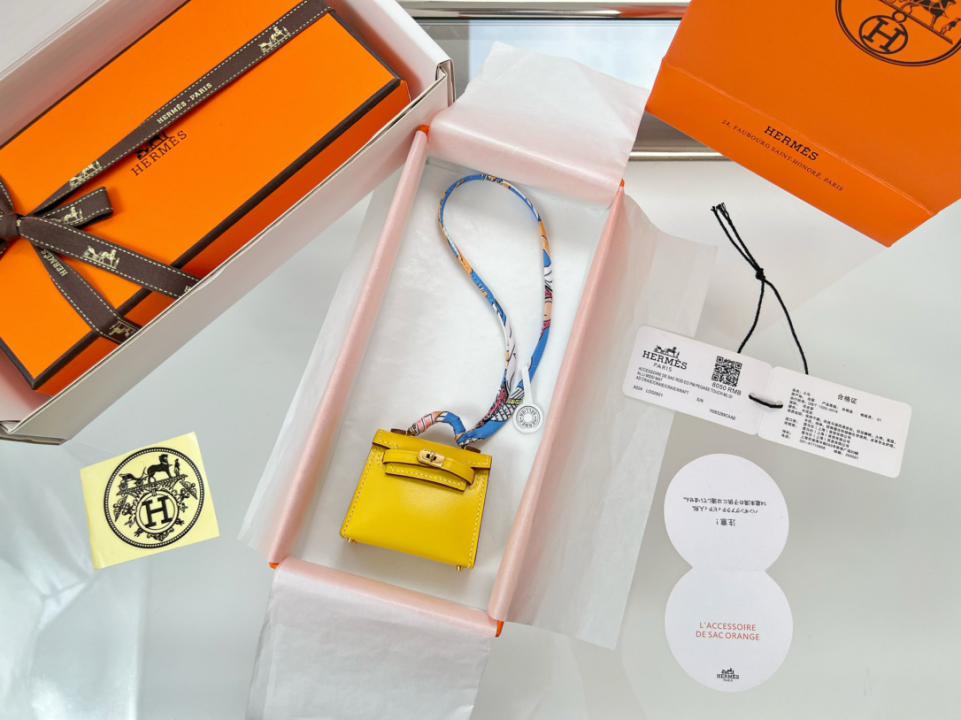 designer,replica,clothing,fake,1:1,lv,luxury,high quality HERMES mini Kelly bag (amber yellow) kelly twilly charm designer,replica,clothing,fake,1:1,lv,luxury,high quality HERMES mini Kelly bag (amber yellow) kelly twilly charm