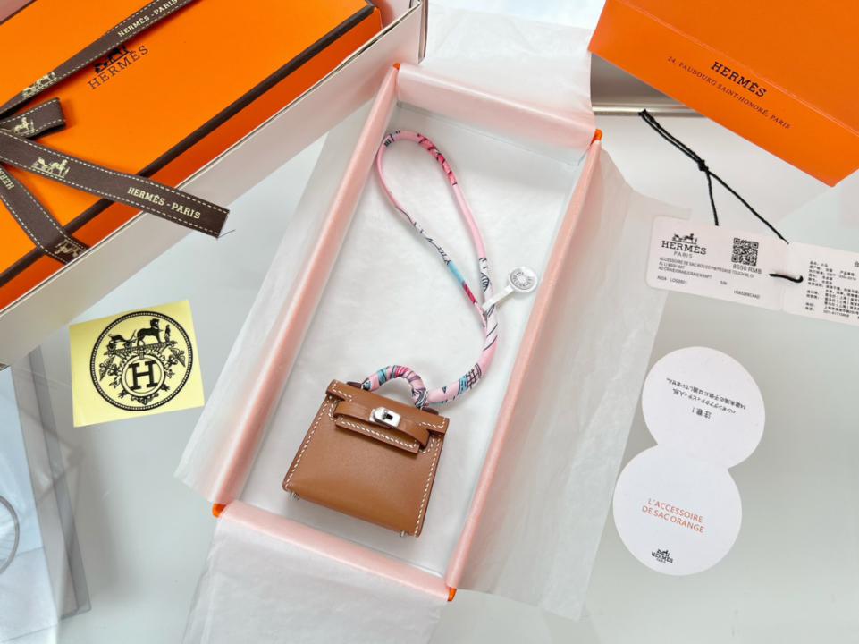 designer,replica,clothing,fake,1:1,lv,luxury,high quality HERMES mini Kelly bag (golden brown) kelly twilly charm designer,replica,clothing,fake,1:1,lv,luxury,high quality HERMES mini Kelly bag (golden brown) kelly twilly charm