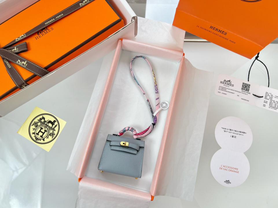 designer,replica,clothing,fake,1:1,lv,luxury,high quality HERMES mini Kelly bag (haze blue) kelly twilly charm designer,replica,clothing,fake,1:1,lv,luxury,high quality HERMES mini Kelly bag (haze blue) kelly twilly charm