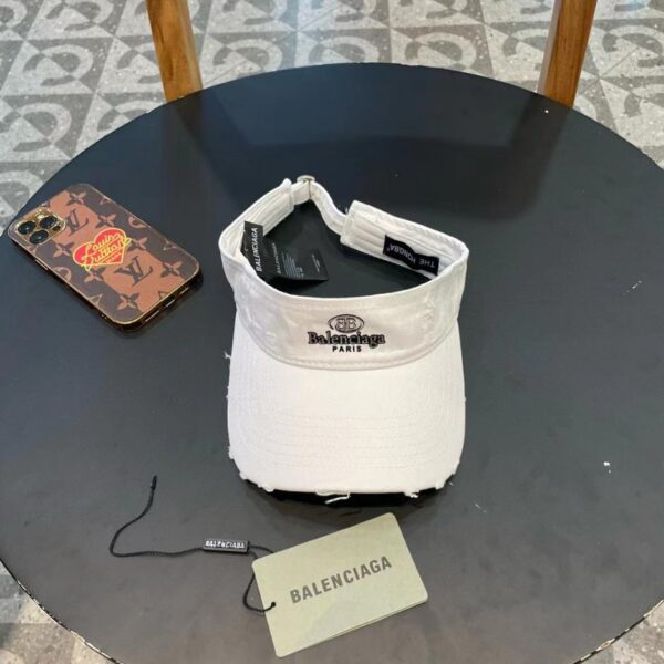 designer,replica,clothing,fake,1:1,lv,luxury,high quality Balenciaga’s scheming torn-brimmed empty top hat