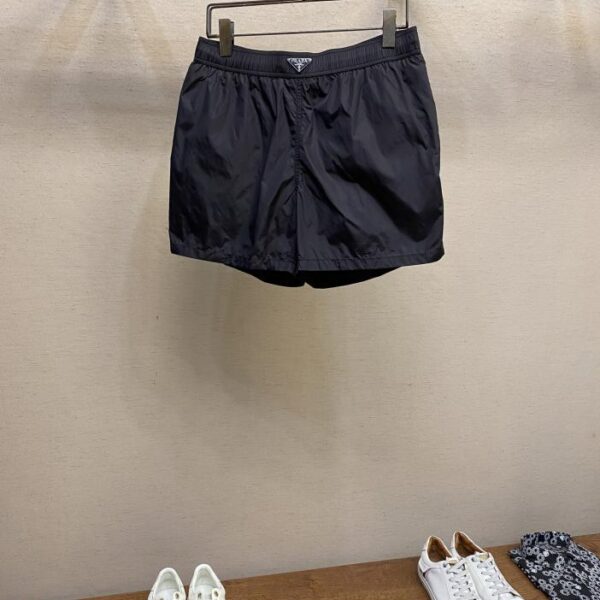 designer,replica,clothing,fake,1:1,lv,luxury,high quality Prada Summer New Men’s Enamel Metal Triangle Logo Nylon Swim Shorts