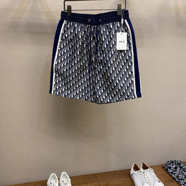 designer,replica,clothing,fake,1:1,lv,luxury,high quality Dior classic old flower navy blue jacquard casual shorts These shorts are made of polyester and cotton blended fabrics, which cleverly combine the advantages of the two materials. Cotton fiber brings excellent skin-friendly feeling and moisture absorption and breathability, keeping the skin dry and comfortable at all times; polyester fiber gives the shorts excellent wear resistance (RKVDC)