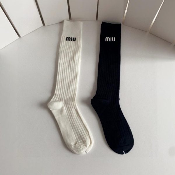 designer,replica,clothing,fake,1:1,lv,luxury,high quality MiuMiu is shipping their new luxury knee-high calf socks, two pairs per box (size 34GFQ).