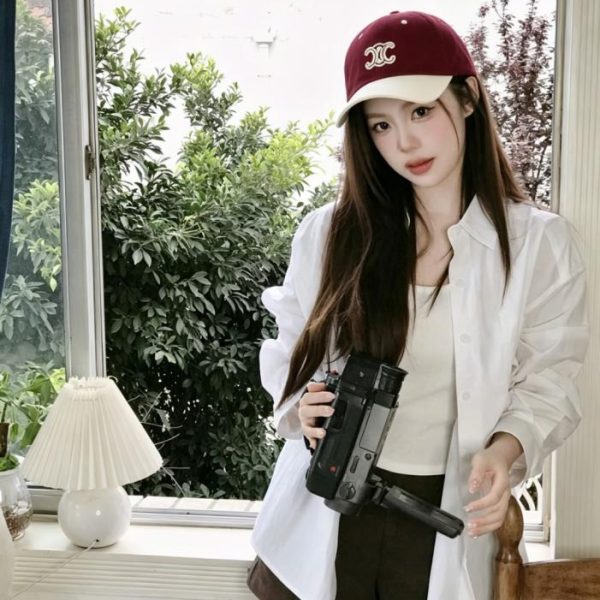 designer,replica,clothing,fake,1:1,lv,luxury,high quality CELINE’s latest baseball cap with minimalist lettering, a style worn by celebrities (K78BOJ)