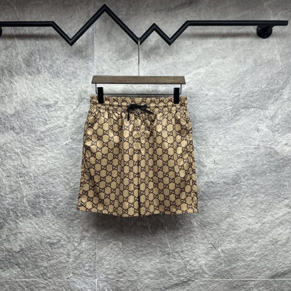 designer,replica,clothing,fake,1:1,lv,luxury,high quality Gucci’s new all-over logo print couple’s beach shorts (K64UAX)