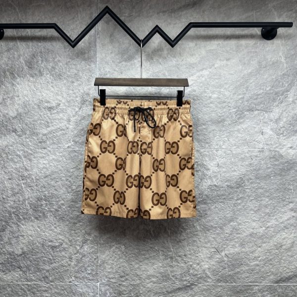 designer,replica,clothing,fake,1:1,lv,luxury,high quality Gucci’s new all-over logo print couple’s beach shorts (O96XK1)