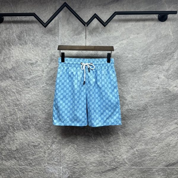 designer,replica,clothing,fake,1:1,lv,luxury,high quality Gucci’s new all-over double Globos print couple’s beach shorts (UIOK5T)
