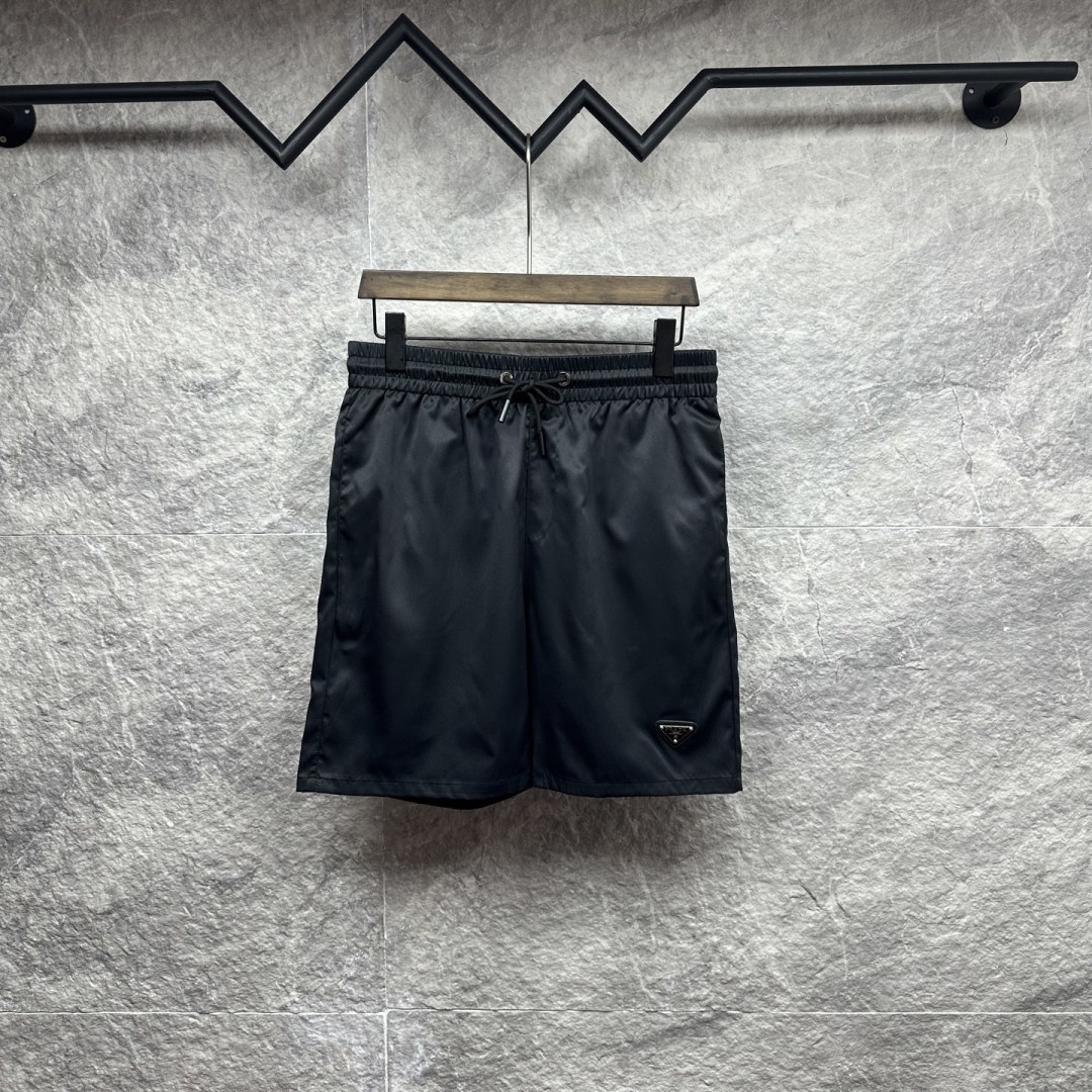 designer,replica,clothing,fake,1:1,lv,luxury,high quality Prada’s new matching beach shorts with the triangle logo at the hem (NG6KB0) for couples. designer,replica,clothing,fake,1:1,lv,luxury,high quality Prada’s new matching beach shorts with the triangle logo at the hem (NG6KB0) for couples.