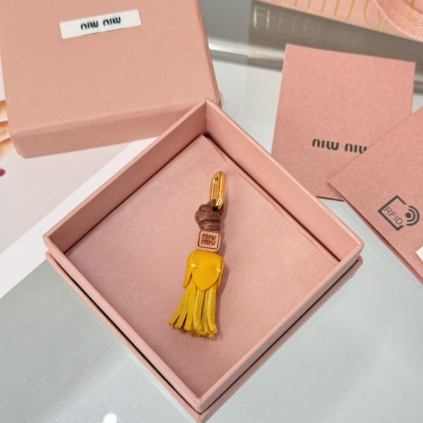 designer,replica,clothing,fake,1:1,lv,luxury,high quality New MIUMIU Mini Tassel Shoe Accessory (YF111S)