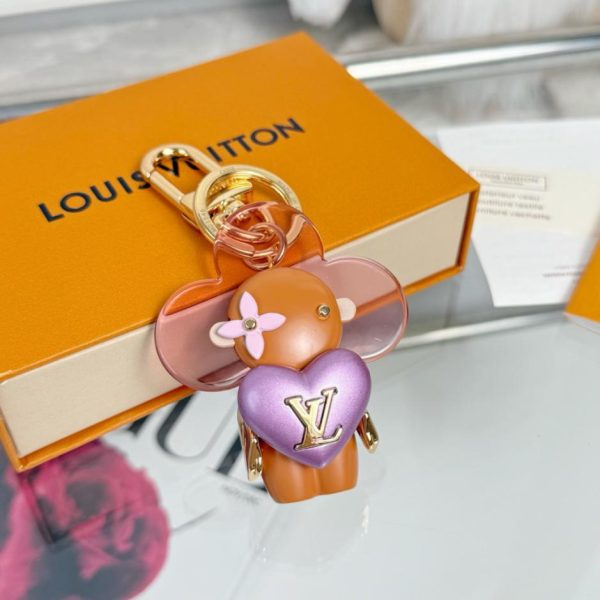 designer,replica,clothing,fake,1:1,lv,luxury,high quality New product: M1990 Sunflower Doll Keychain Louis Vuitton Vivian Keychain (WV987M)